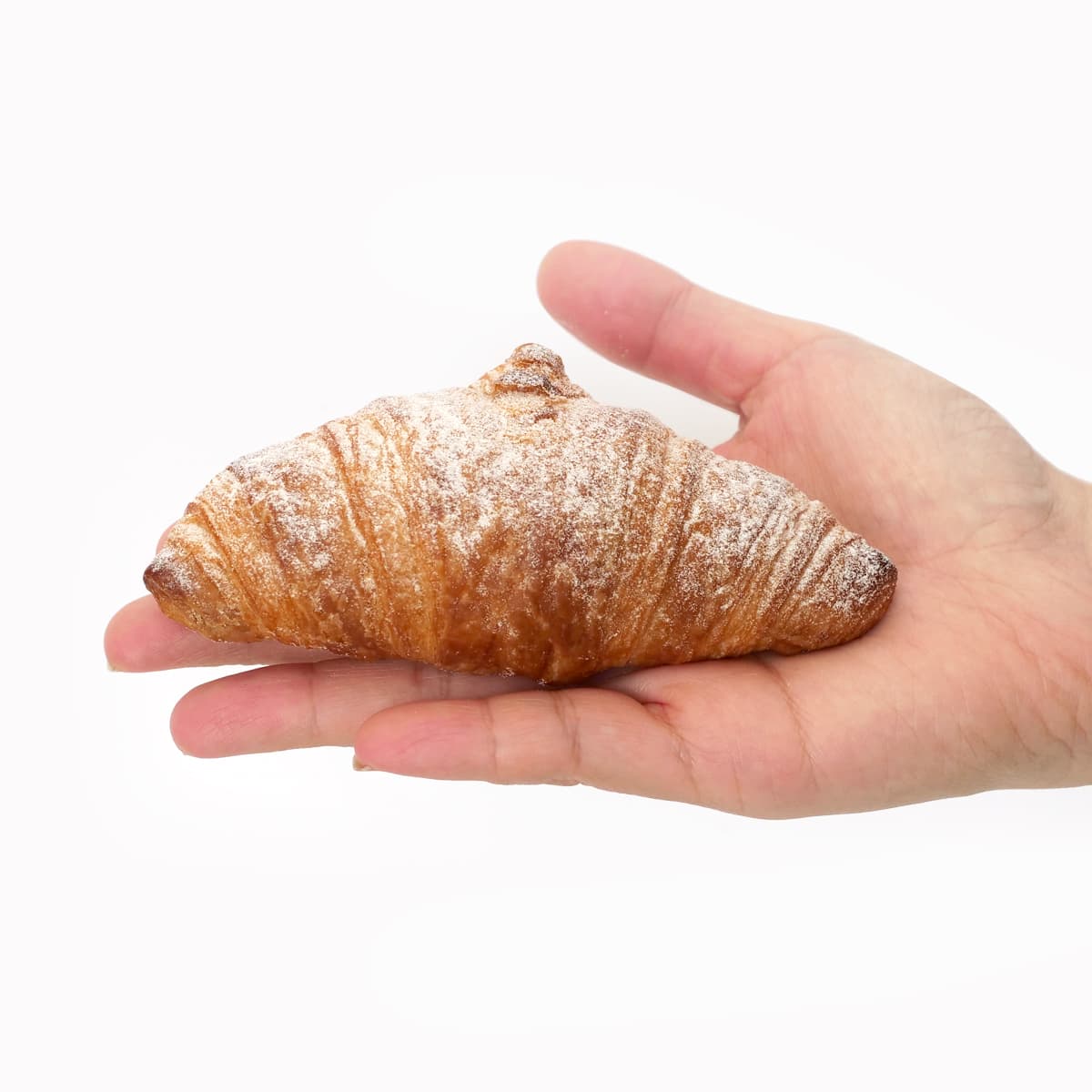 ミニカスタードクリームクロワッサン　1個（手にのせた）
